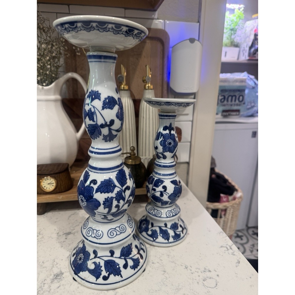 Pair Of 2 blue and white chinoiserie porcelain candlesticks. Stunning